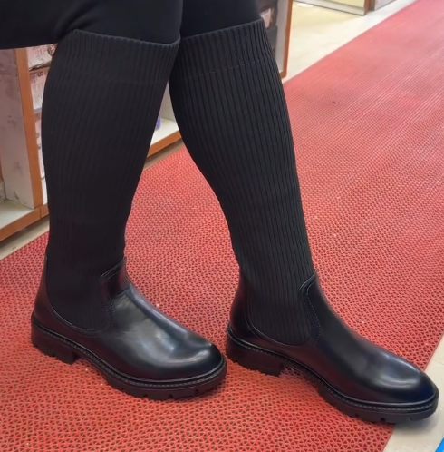 Step Up Your Style: Women's Black Knee-High Sock Boots with Chunky Lug Sole