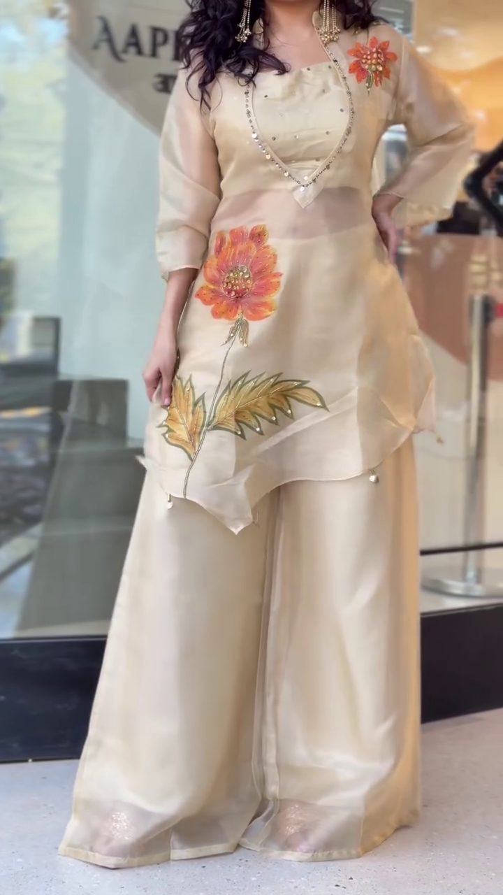 Champagne Shimmer Hand-Painted Floral Kurta & Palazzo Set — Artful Elegance with a Festive Glow