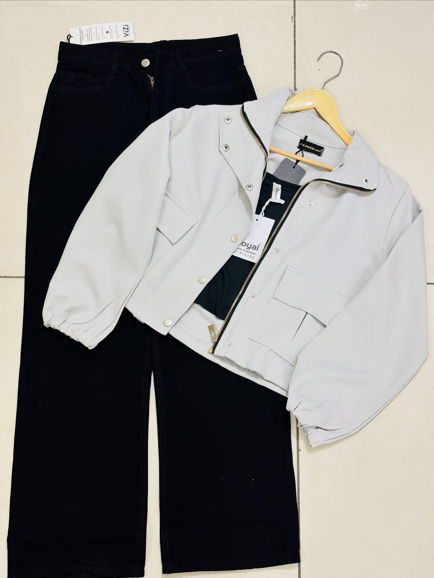 Elevate Your Everyday Look with a Trendy Black Cropped Jacket & Classic Light-Wash Denim Combo