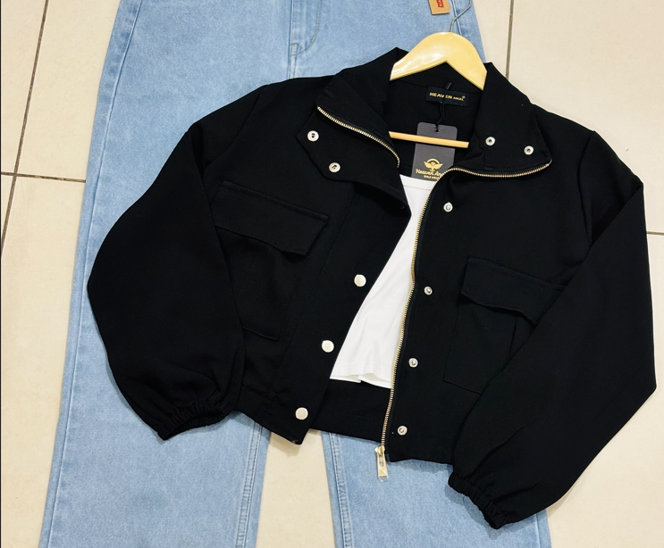 Elevate Your Everyday Look with a Trendy Black Cropped Jacket & Classic Light-Wash Denim Combo