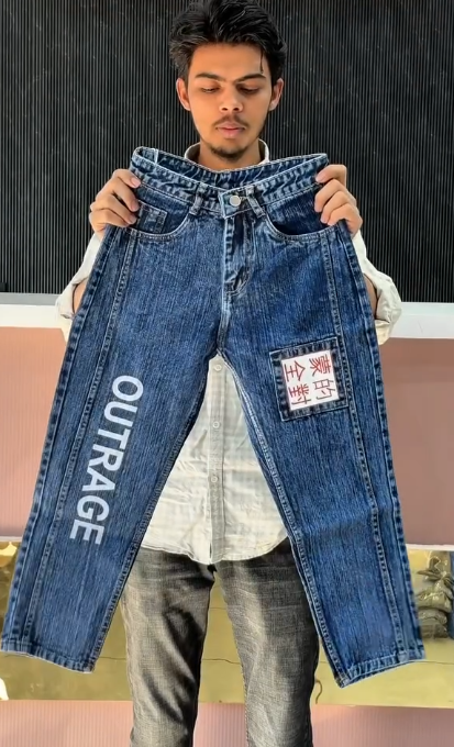 Black Denim Jeans with “OUTRAGE” Print and Chinese Character Patch – Bold Streetwear Statement