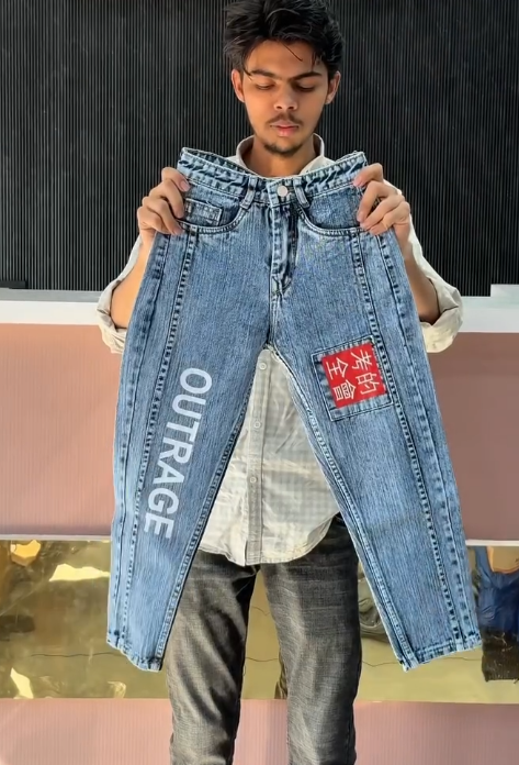 Black Denim Jeans with “OUTRAGE” Print and Chinese Character Patch – Bold Streetwear Statement