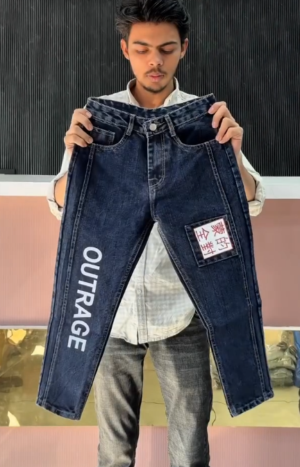 Black Denim Jeans with “OUTRAGE” Print and Chinese Character Patch – Bold Streetwear Statement