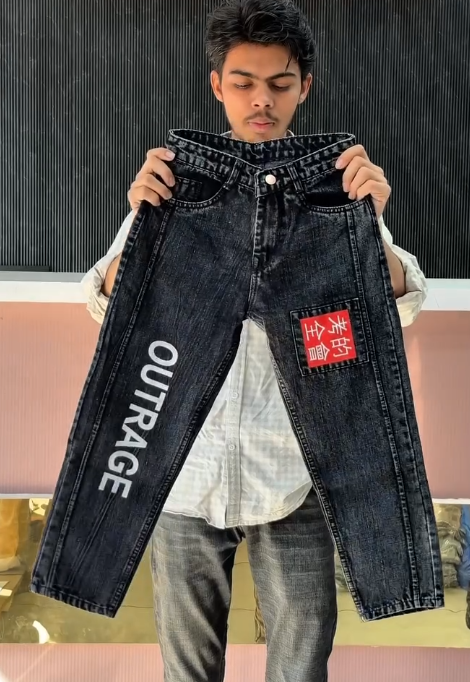 Black Denim Jeans with “OUTRAGE” Print and Chinese Character Patch – Bold Streetwear Statement