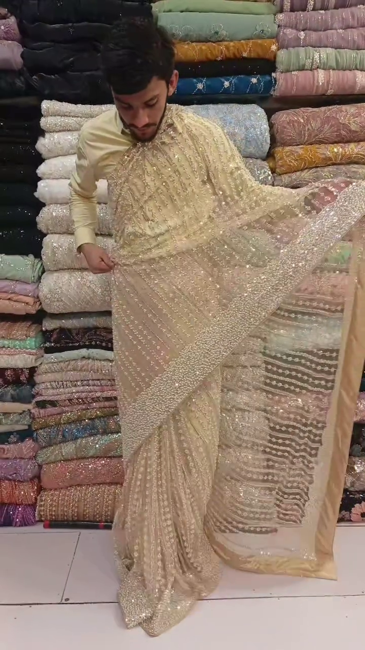 Elegant Cream/Golden Beige Net Saree with Intricate Bead & Sequin Embellishments