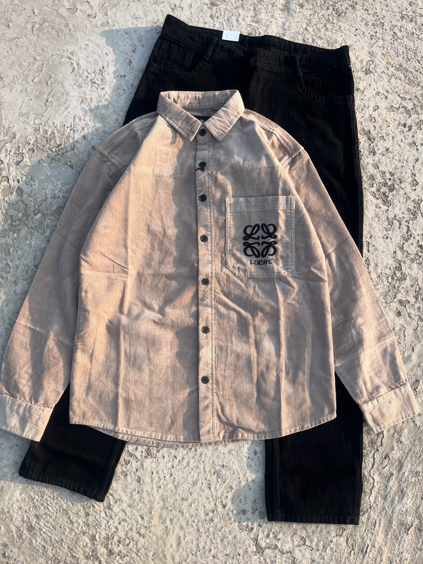 Bold & Contemporary: Red Corduroy Loewe Overshirt with White Pants