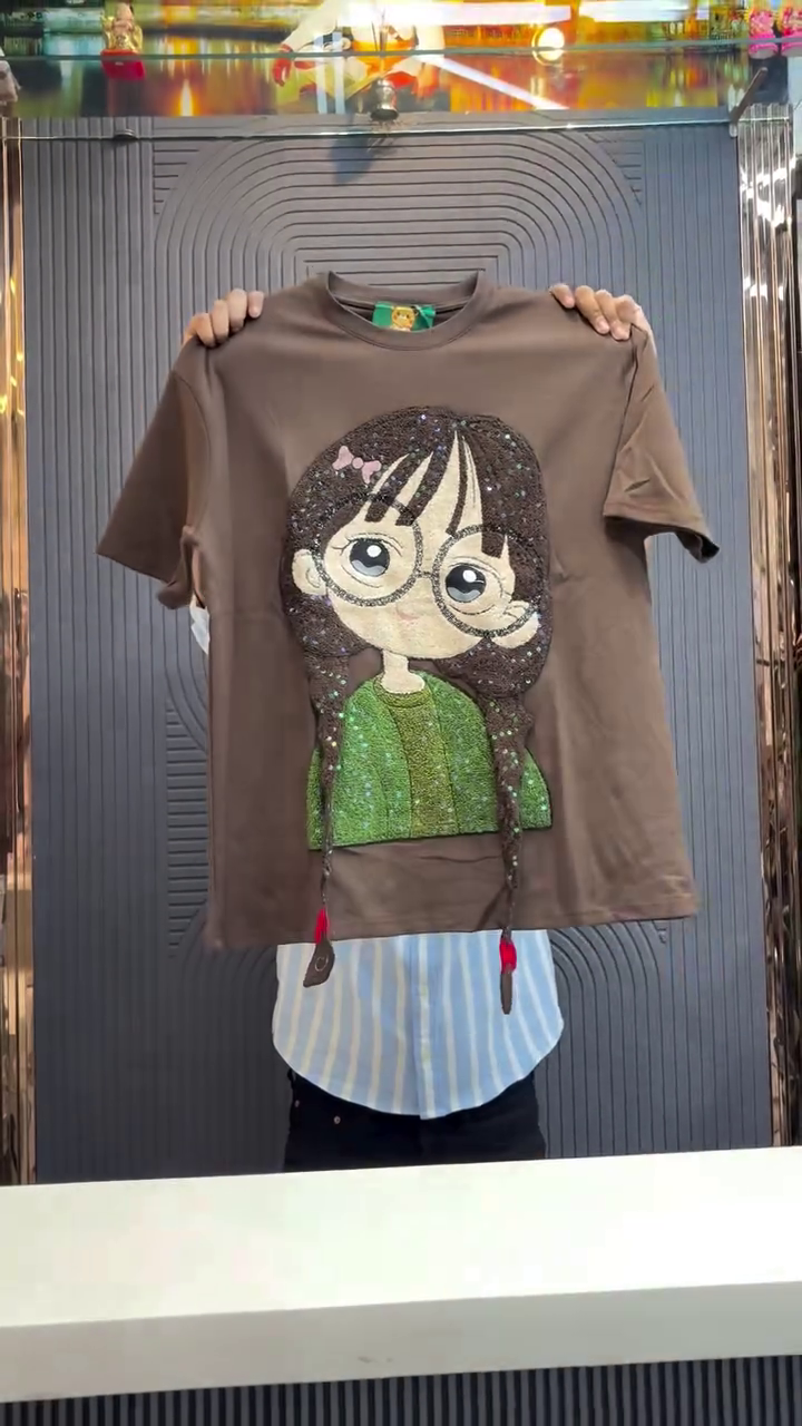 Playful Pop: Yellow T-Shirt with Eye-Catching 3D Cartoon Graphic