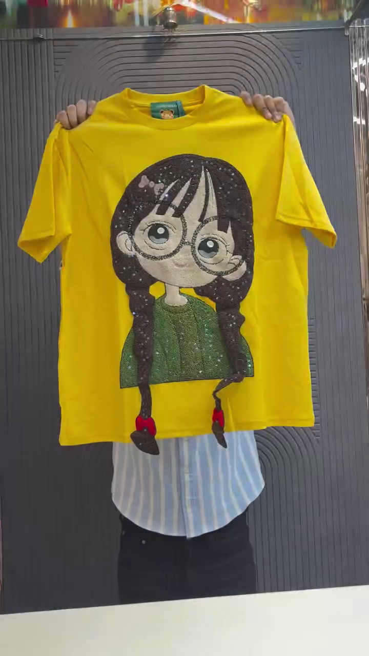 Playful Pop: Yellow T-Shirt with Eye-Catching 3D Cartoon Graphic