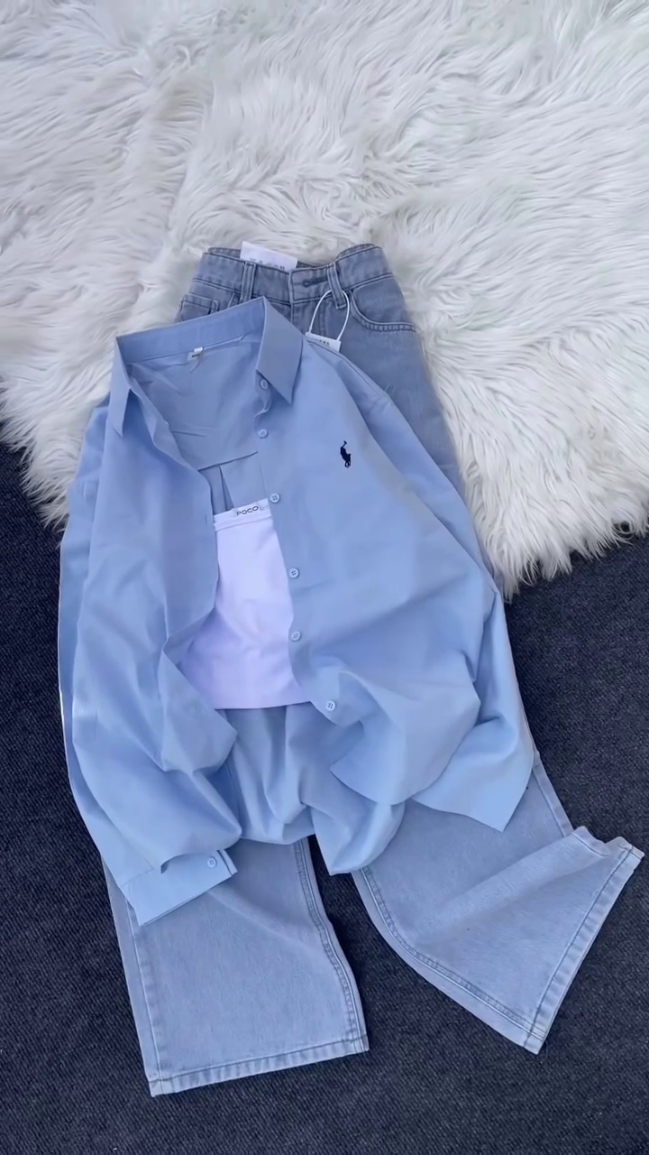 Layered Elegance: Pink Ralph Lauren Button-Down Shirt with White Top & Grey Jeans