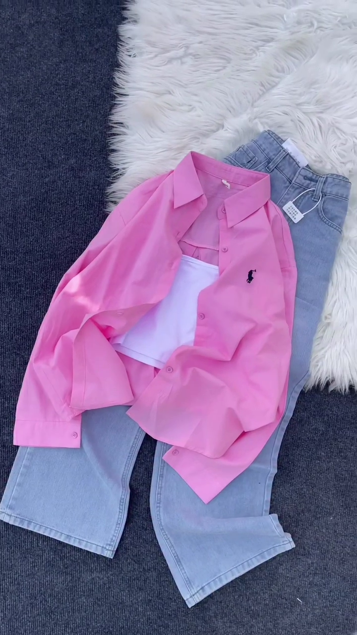 Layered Elegance: Pink Ralph Lauren Button-Down Shirt with White Top & Grey Jeans