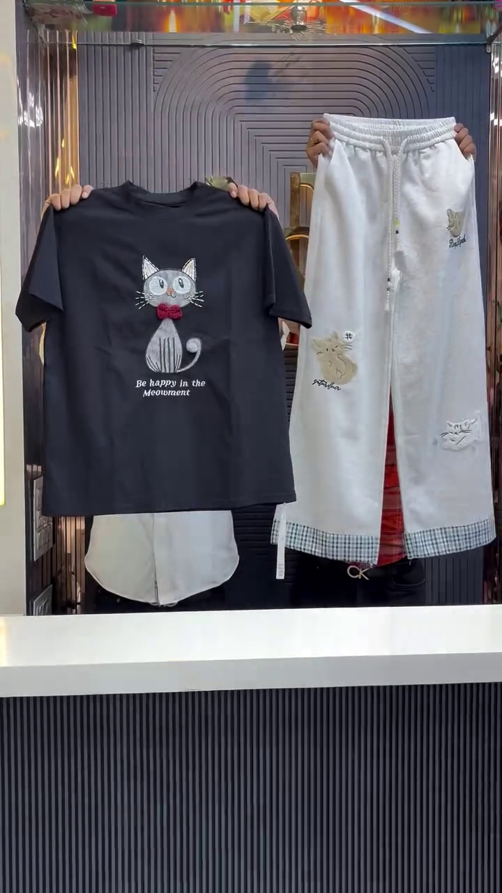 Playful Comfort: White Cat-Print T-Shirt with Black Hello Kitty Joggers