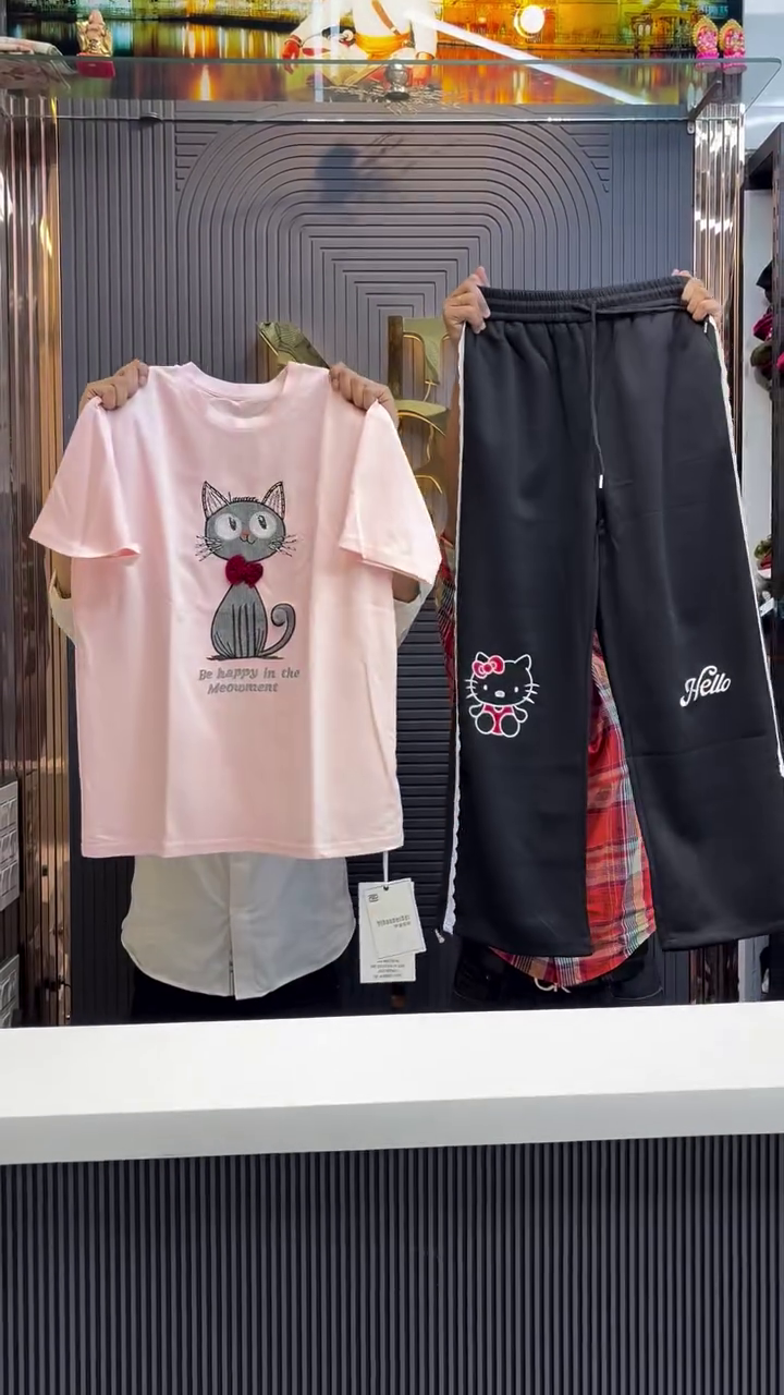 Playful Comfort: White Cat-Print T-Shirt with Black Hello Kitty Joggers