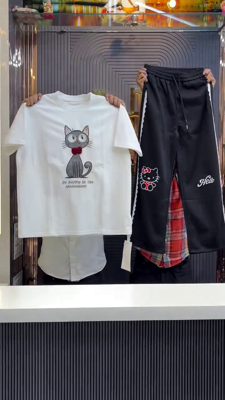 Playful Comfort: White Cat-Print T-Shirt with Black Hello Kitty Joggers