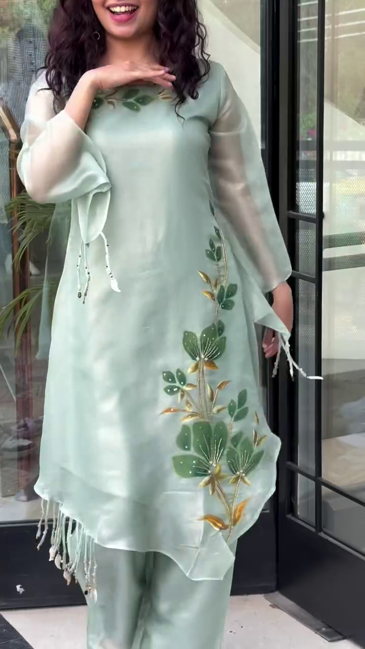 Ethereal Grace: Light Green Organza Kurta Set with Hand-Painted Floral Motifs