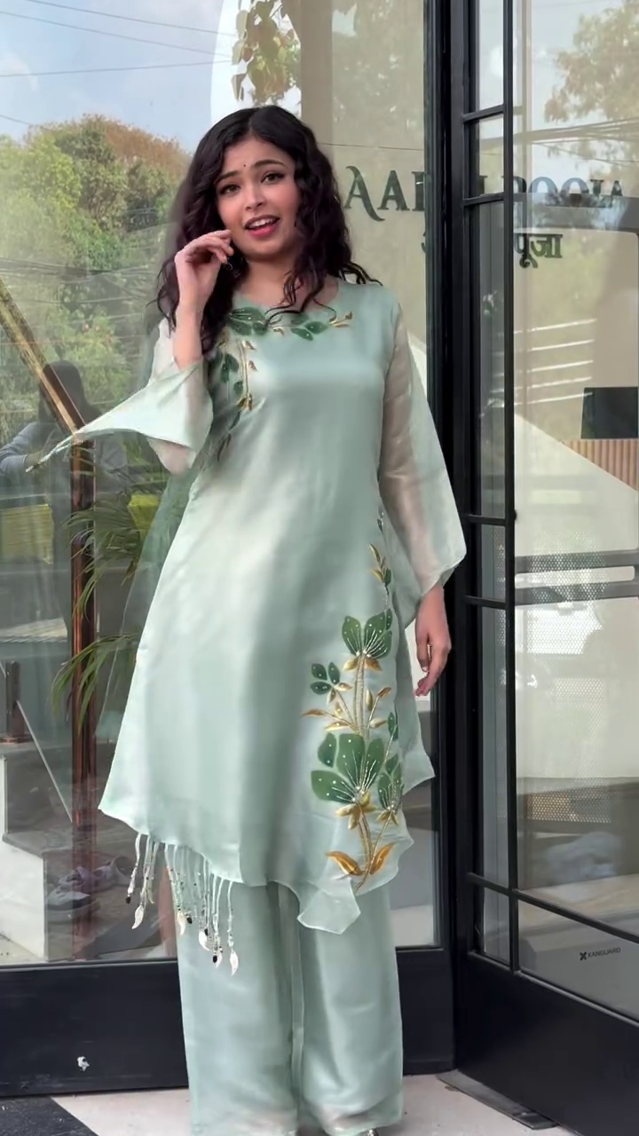 Ethereal Grace: Light Green Organza Kurta Set with Hand-Painted Floral Motifs