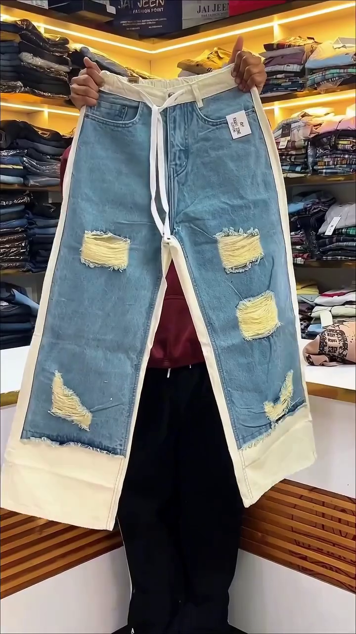 Trendy Street Style: Patchwork Wide-Leg Jeans with Distressed Detailing