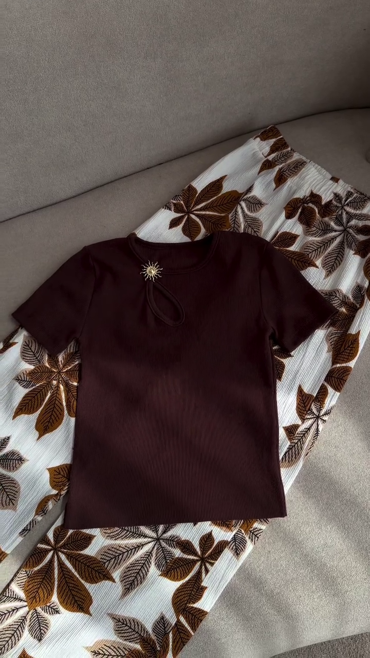 Effortless Elegance: Maroon T-Shirt with White Leaf-Patterned Wide-Leg Trousers