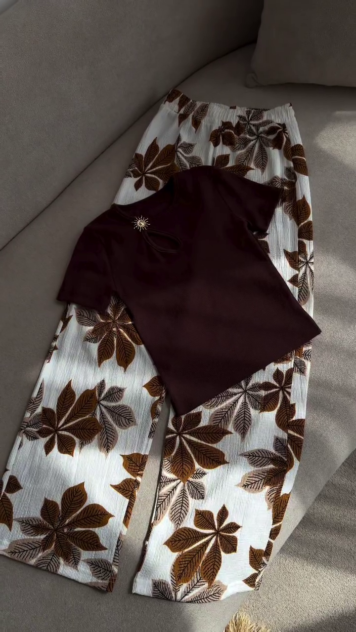 Effortless Elegance: Maroon T-Shirt with White Leaf-Patterned Wide-Leg Trousers