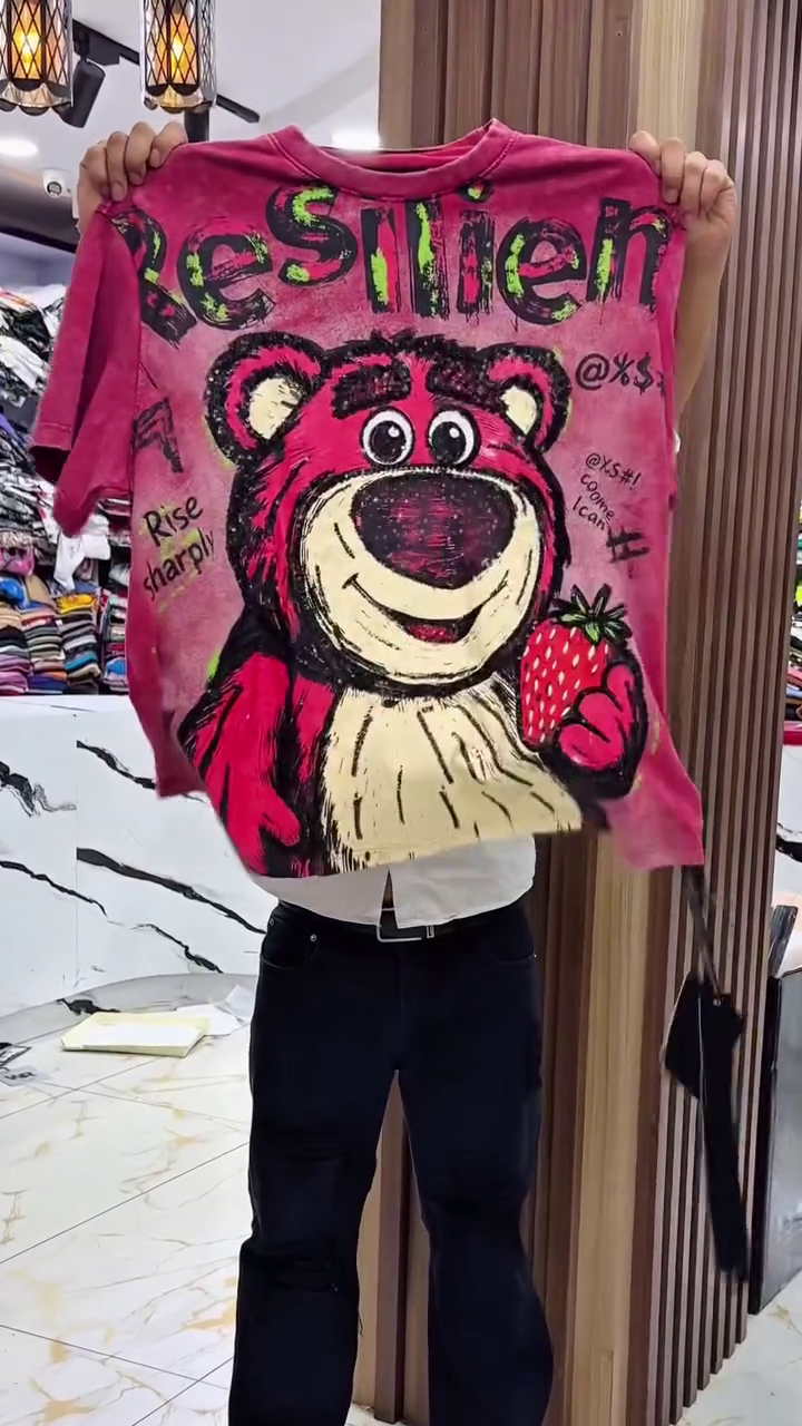 Playful Vibes: Light Blue Snoopy Graphic T-Shirt with “GOOD FORTUNE” Print