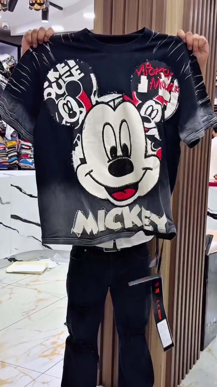 Playful Vibes: Light Blue Snoopy Graphic T-Shirt with “GOOD FORTUNE” Print