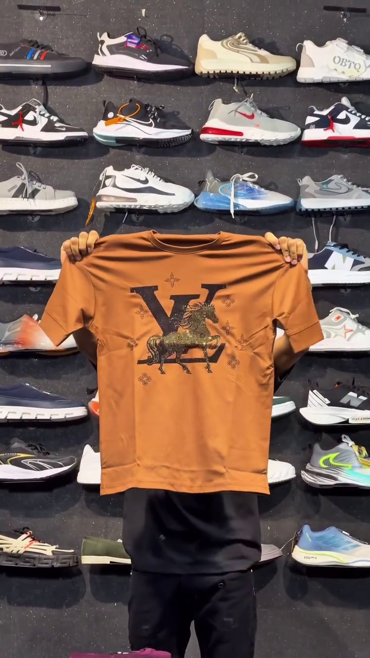 Elevated Essentials: Brown T-Shirt with Embellished Logo for a Refined Streetwear Look