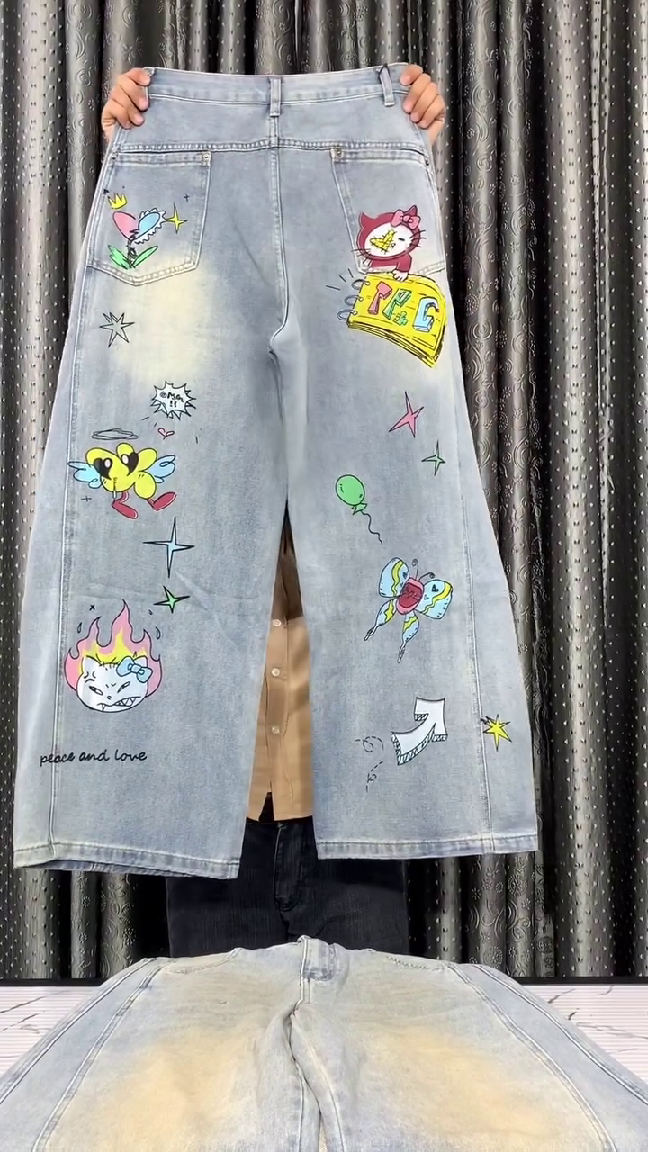 Playful Street Style: Women’s Light-Wash Wide-Leg Denim Jeans with Disney Cartoon Prints