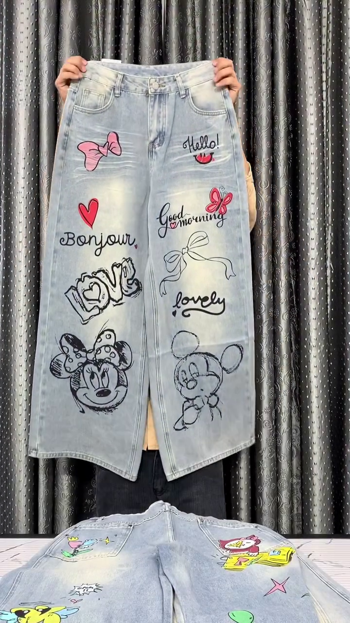 Playful Street Style: Women’s Light-Wash Wide-Leg Denim Jeans with Disney Cartoon Prints
