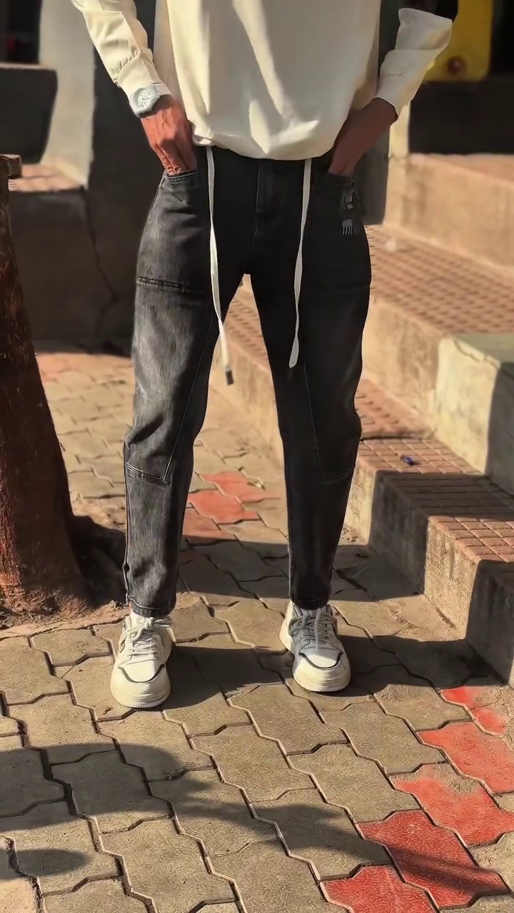 Urban Edge Redefined: Unisex Black Baggy Jeans with Panelled Streetwear Design