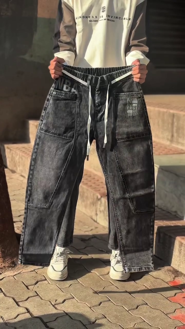 Urban Edge Redefined: Unisex Black Baggy Jeans with Panelled Streetwear Design