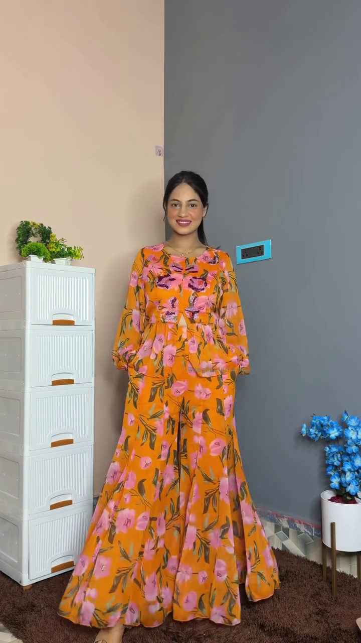 Effortless Coordinated Chic: Printed Peplum Top with Wide-Leg Palazzo Pants Set