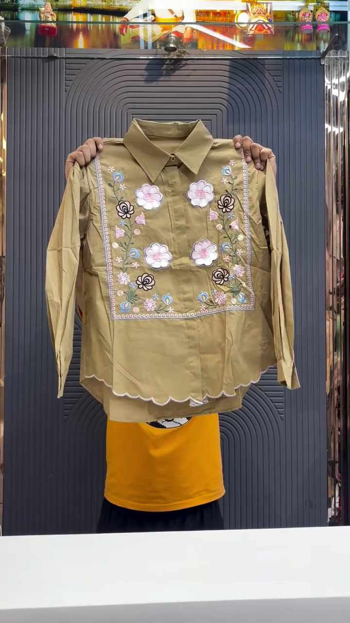 Elegant Statement Wear: Black Shirt with Vibrant Floral Embroidery