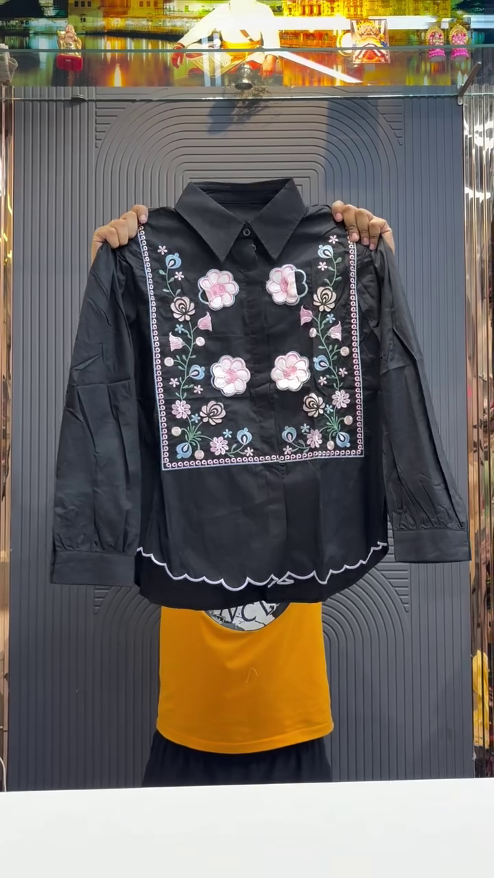 Elegant Statement Wear: Black Shirt with Vibrant Floral Embroidery