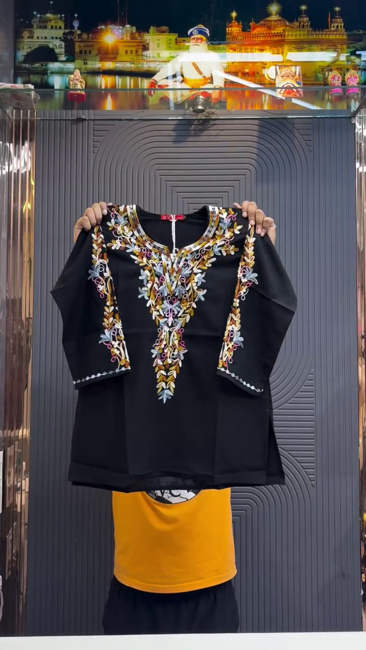 Elegant Ethnic Charm: Black Short Kurti with Intricate Floral Embroidery
