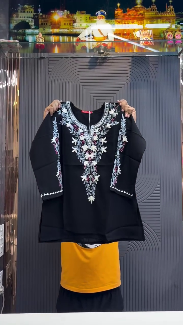Elegant Ethnic Charm: Black Short Kurti with Intricate Floral Embroidery