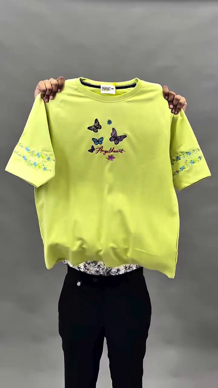 Bold & Bright Street Style: Yellow Oversized Graphic Tee with Floral Embroidered Sleeves