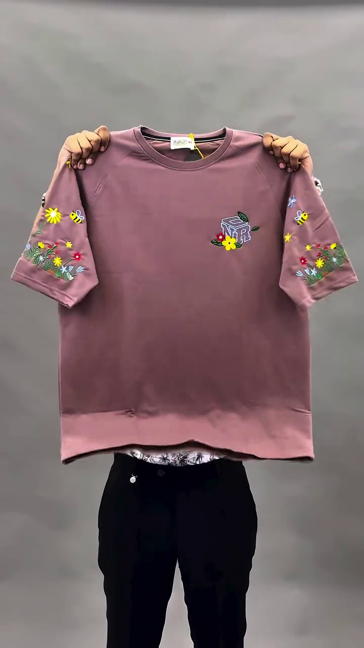 Bold & Bright Street Style: Yellow Oversized Graphic Tee with Floral Embroidered Sleeves