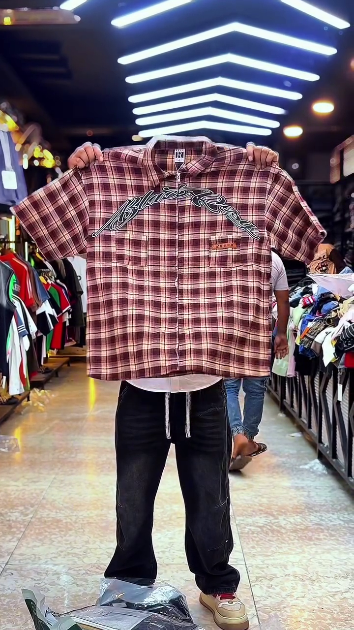 Edgy Street Casual: Red Plaid Checkered Shirt with Ink-Splatter & Graphic Branding