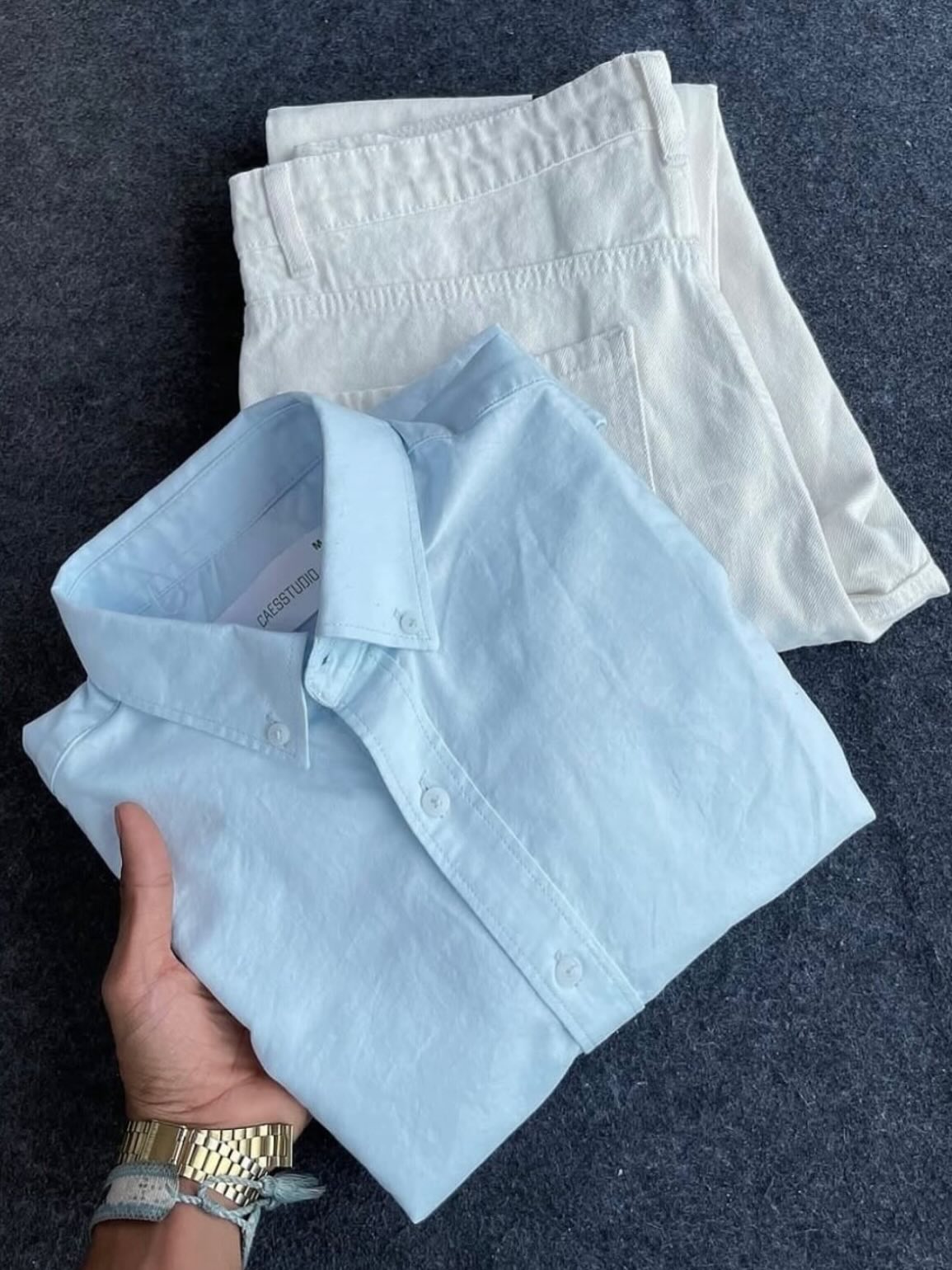 Effortless Summer Elegance: Light Blue Linen Shirt with Crisp White Trousers