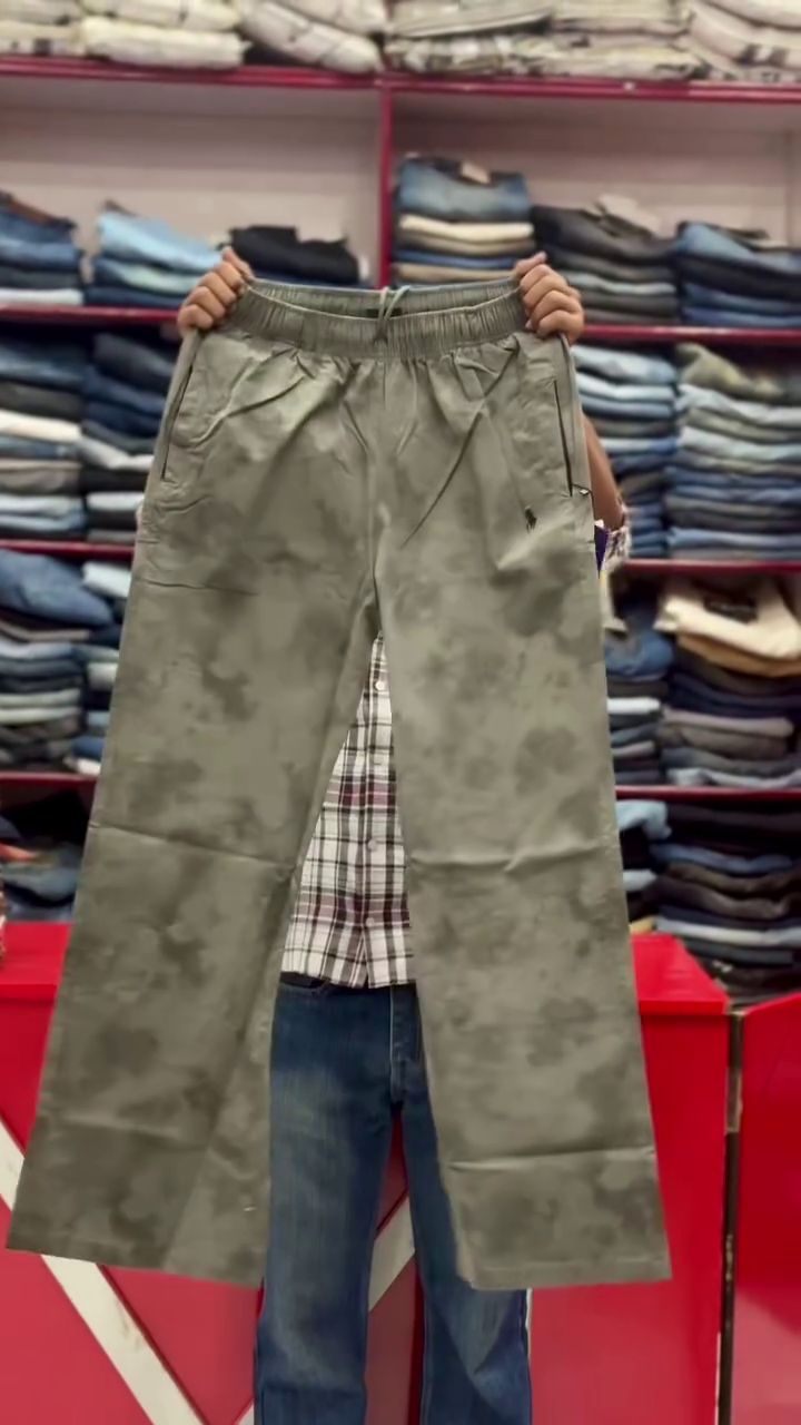 These white men's tie-dye trousers with a drawstring waist are categorized as casual wear or fashion pants.