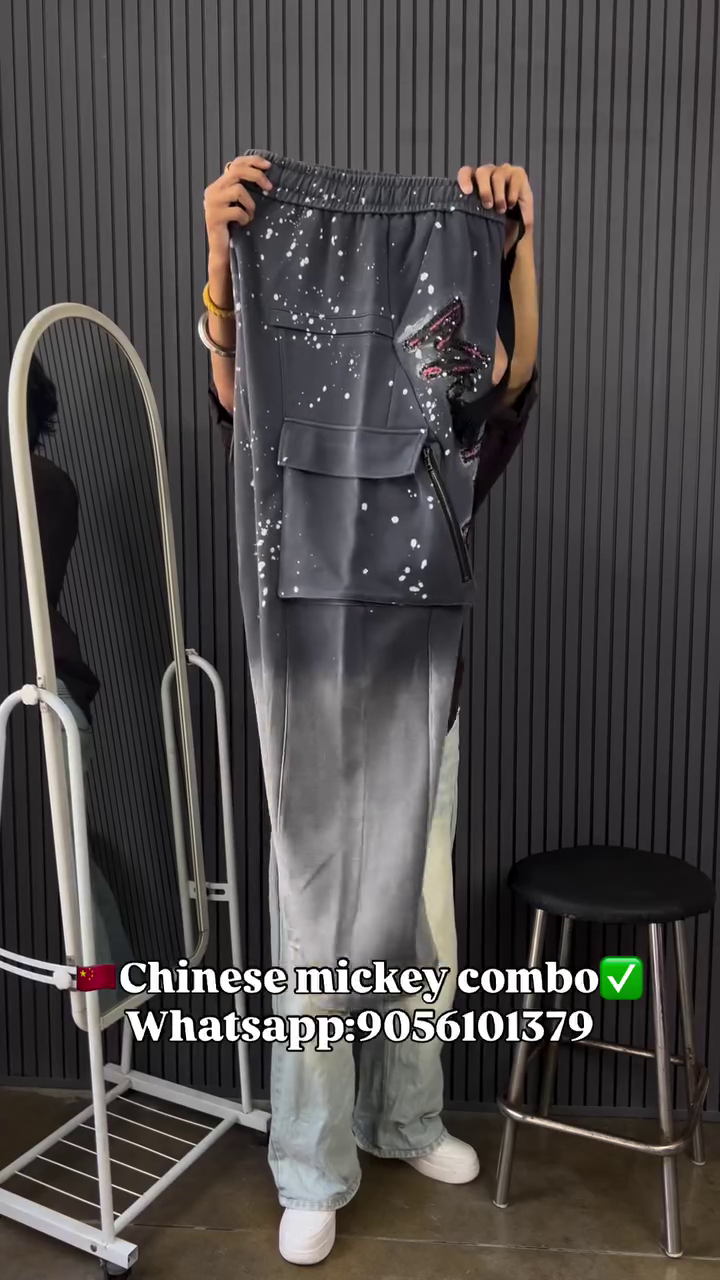 This image shows a black cotton oversized graphic t-shirt and trouser featuring multiple prints of the Disney character Minnie Mouse.