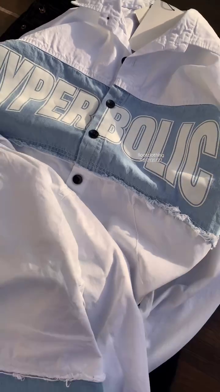 This shirt is a premium designer denim shirt from Root Clothing featuring a "Hyperbolic" graphic.