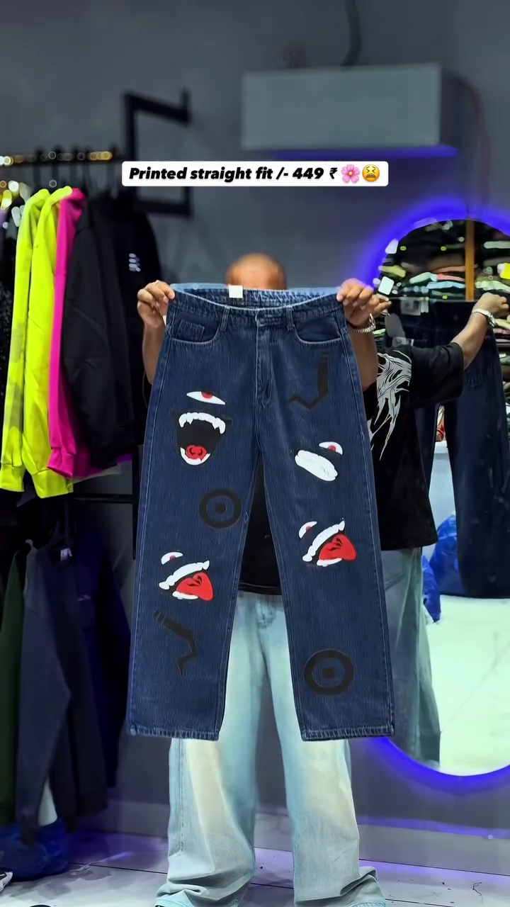 The item shown is a pair of printed straight-fit jeans