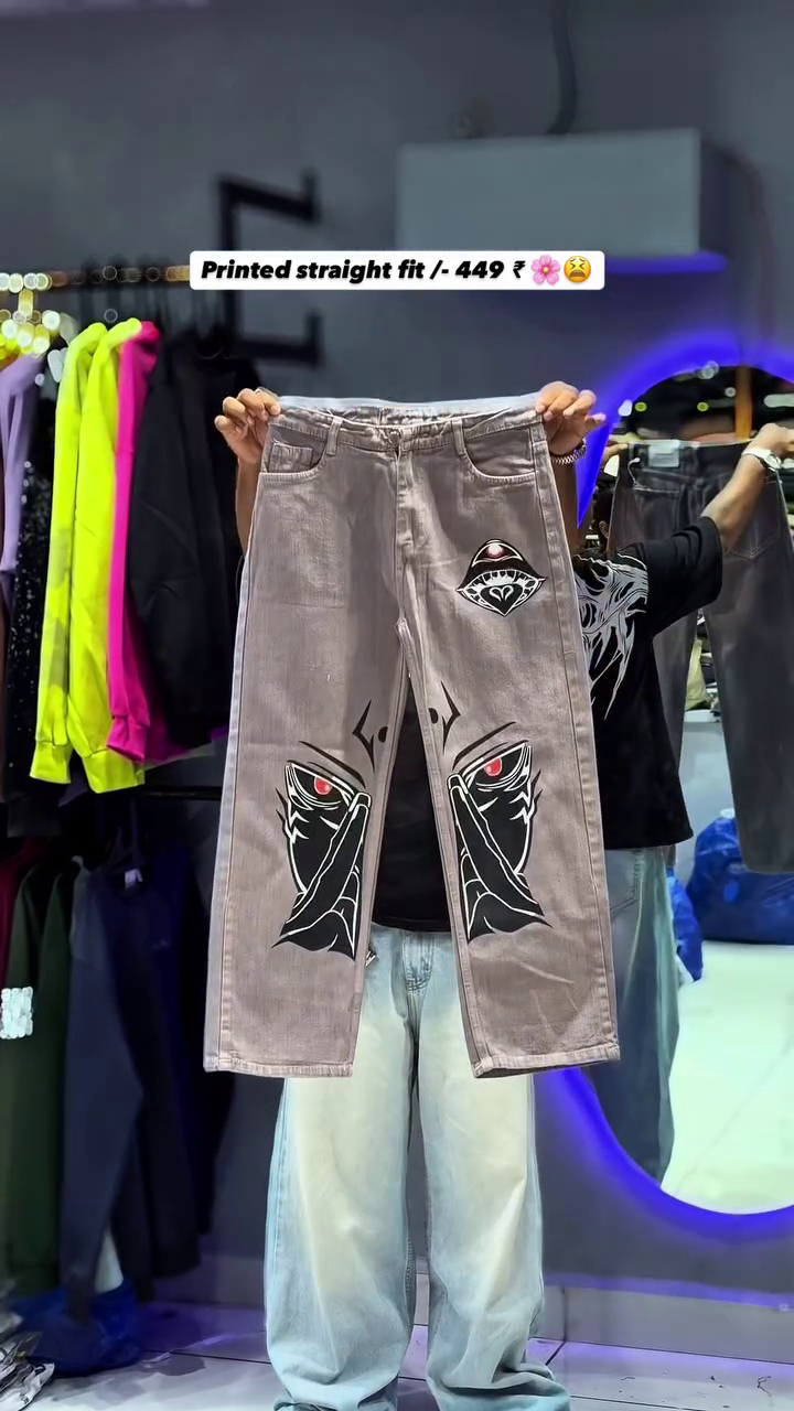 The item shown is a pair of printed straight-fit jeans