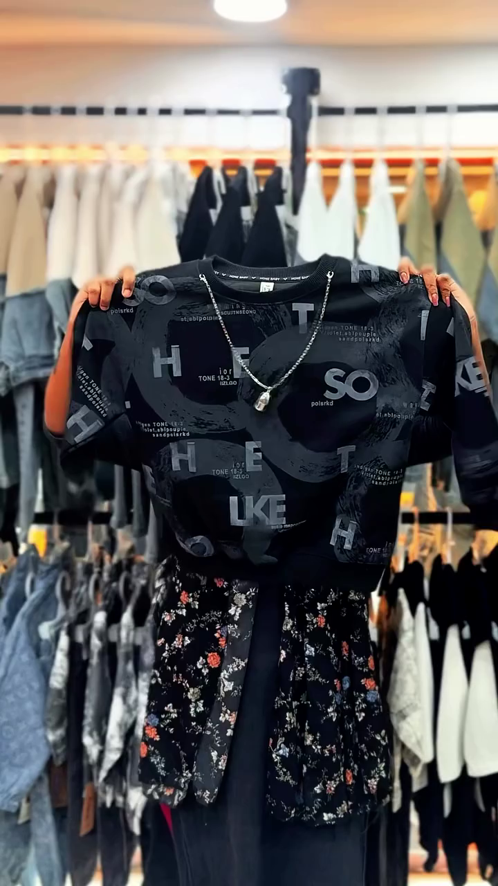 This Zapzio Imported Kids Korean T-shirt features a distinctive zipper design and is marketed as a premium, stylish option for summer wear.