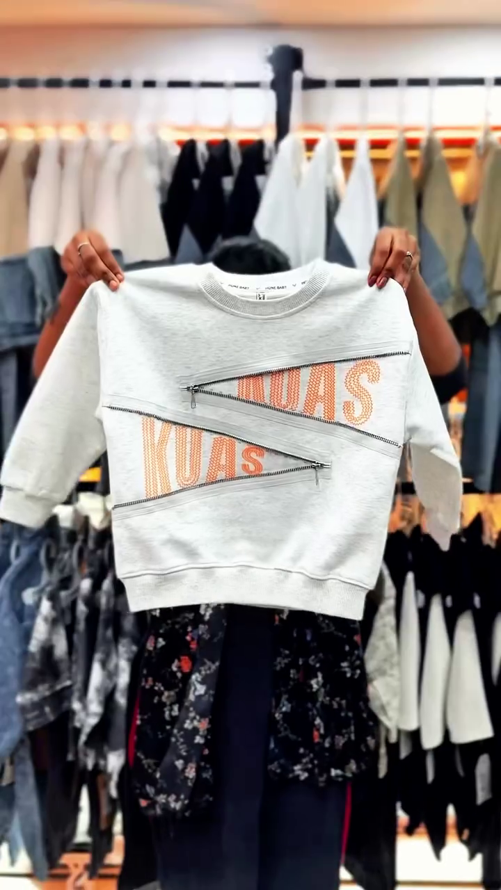 This Zapzio Imported Kids Korean T-shirt features a distinctive zipper design and is marketed as a premium, stylish option for summer wear.